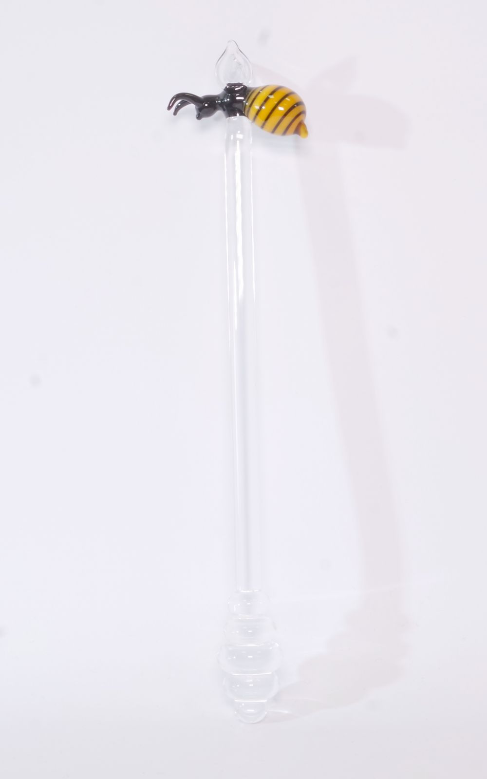 Honigspirale mit Biene und Ablageschale Honigspirale mit Biene und Ablageschale